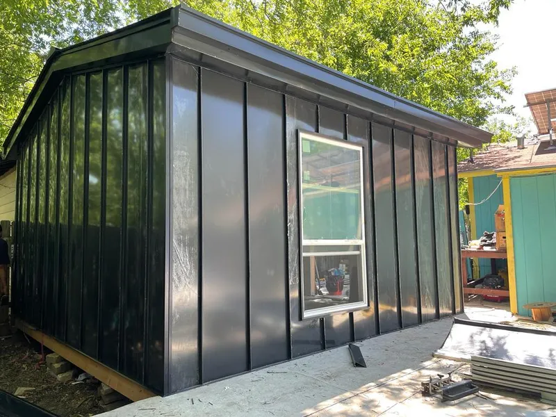 Black standing seam metal wall panels for Metal Roof Installation in Durham