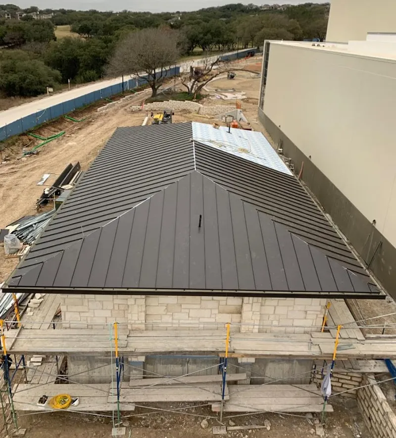 Metal roof new construction with scaffolding in Durham
